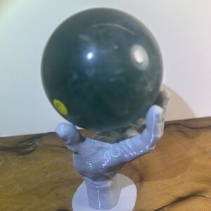 Teal green fluorite sphere. 330 g